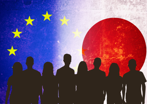 Silhouettes in front of EU-Japan flags